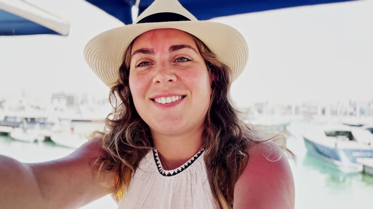 Athens Travel Vlog: Woman Waves from Marina Cafe