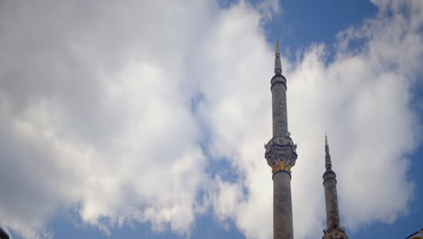 mosque minarets against a cloudy sky