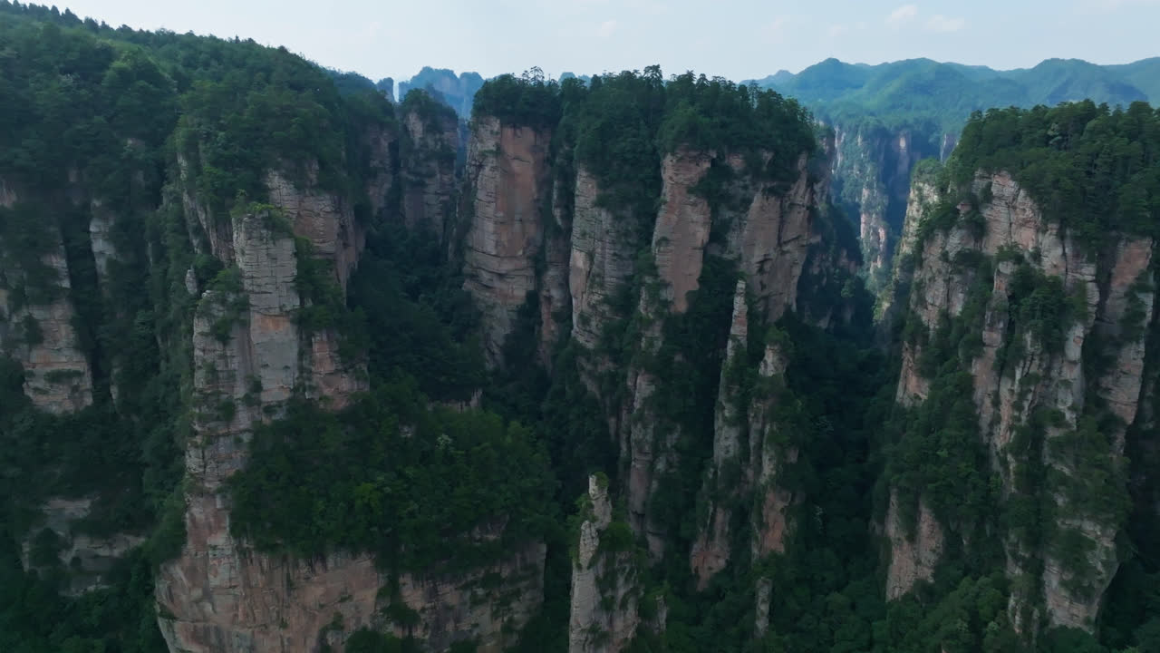 AERIAL: Towering karst mountains in the Zhangjiajie natural forest park, China