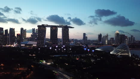 singapore skyline dusk marina bay sands, aerial 4k