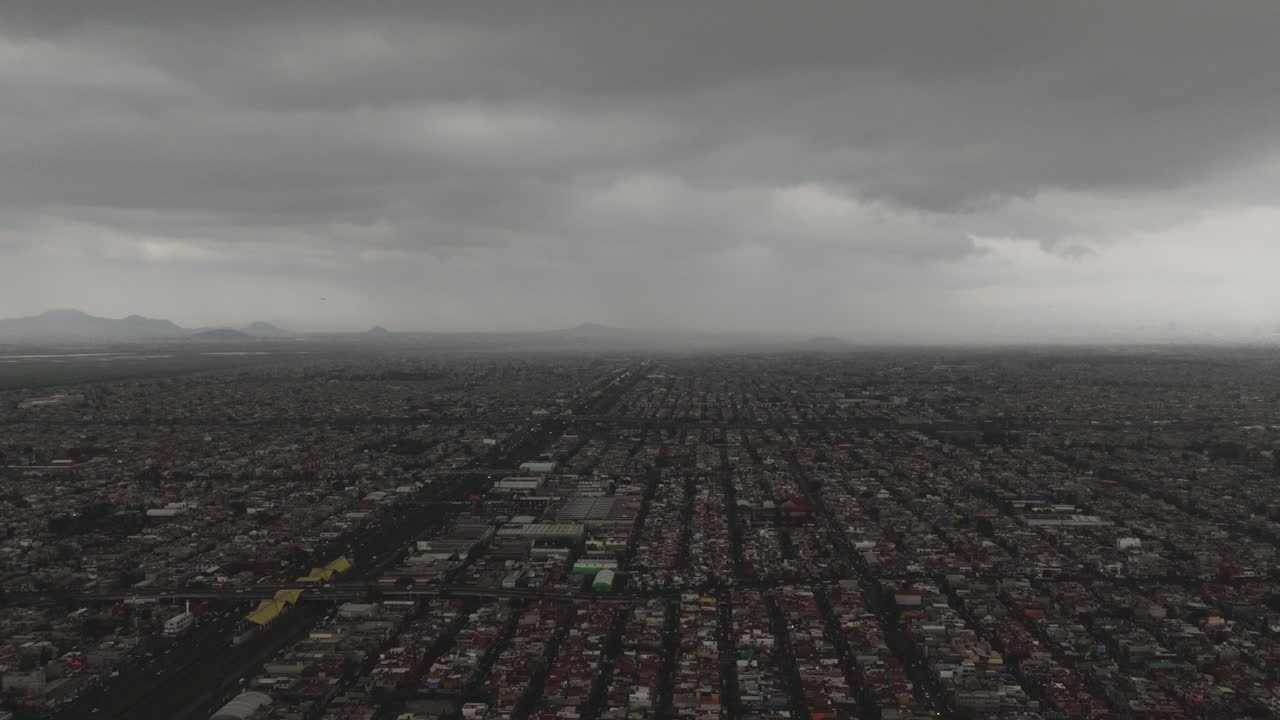 Aerial drone view shows a gloomy, rainy afternoon in Ecatepec