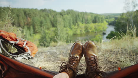 pov of tourist looking at nature from campsite