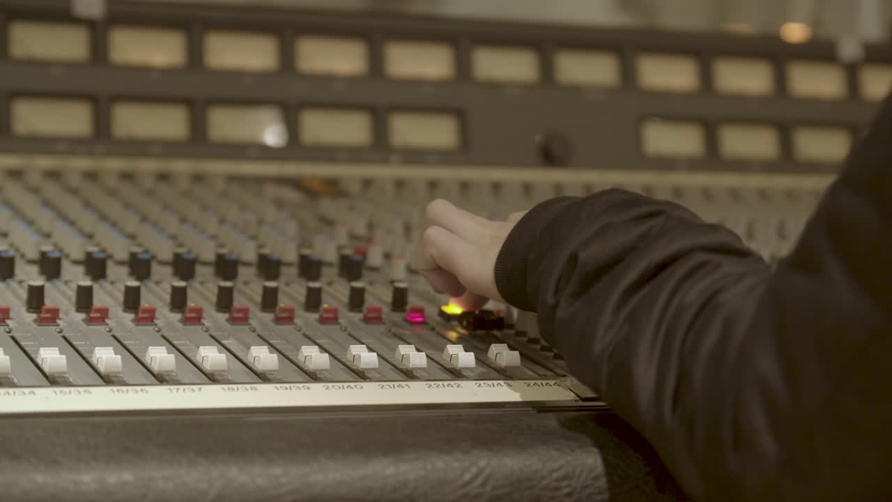 Recording studio - Slo-mo (60fps) Vintage recording desk with engineer pressing talk back button