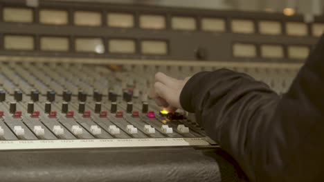 recording studio - slo-mo (60fps) vintage recording desk with engineer pressing talk back button