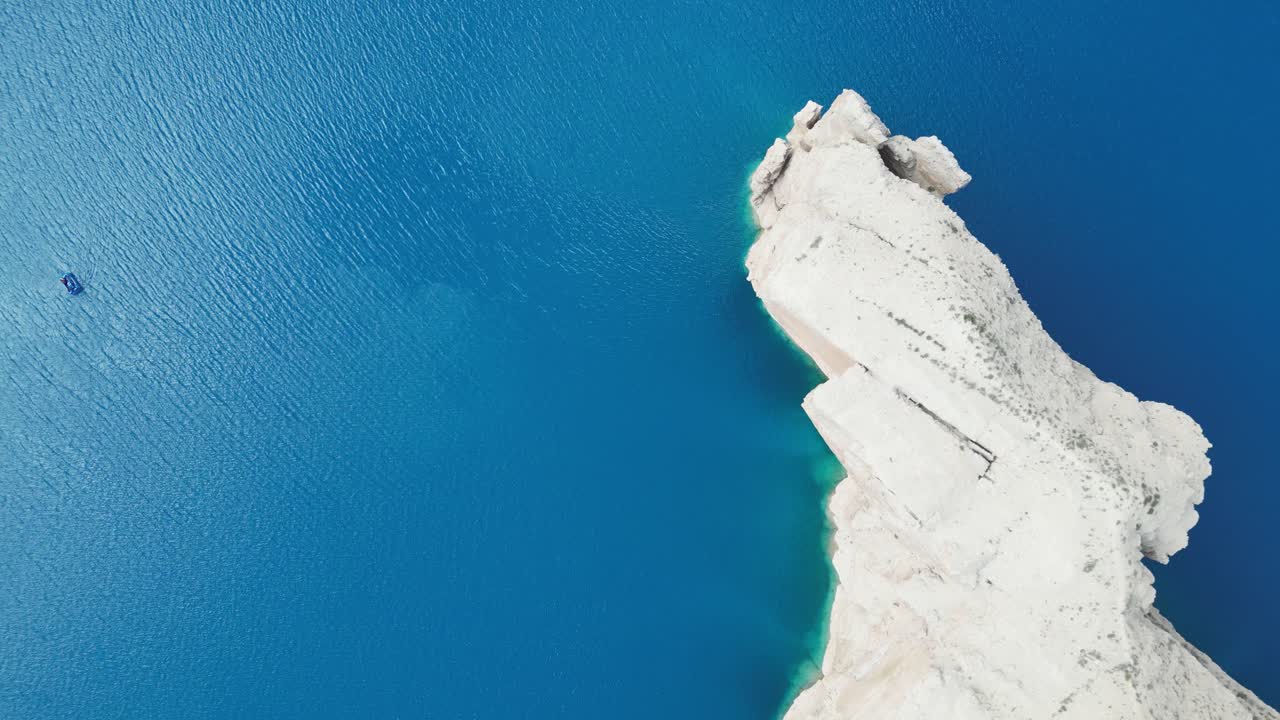 Band E Amir Drone Aerial, Afghanistan. Pristine turquoise lake oasis, lush trees in desert landscape, top down view