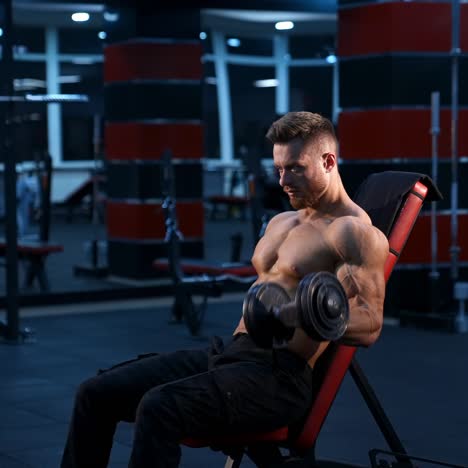 athletic man with dumbbells