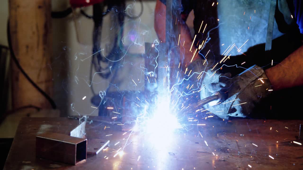Welder welding a metal