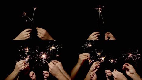 Hands-holding-and-waving-Bengal-fires.-New-year-sparkler-candle-burning-on-a-black-background