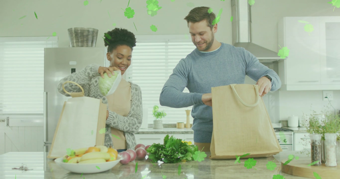 VFX tech removing green overlay obscuring produce as couple unpacking lettuce fixing shot for food