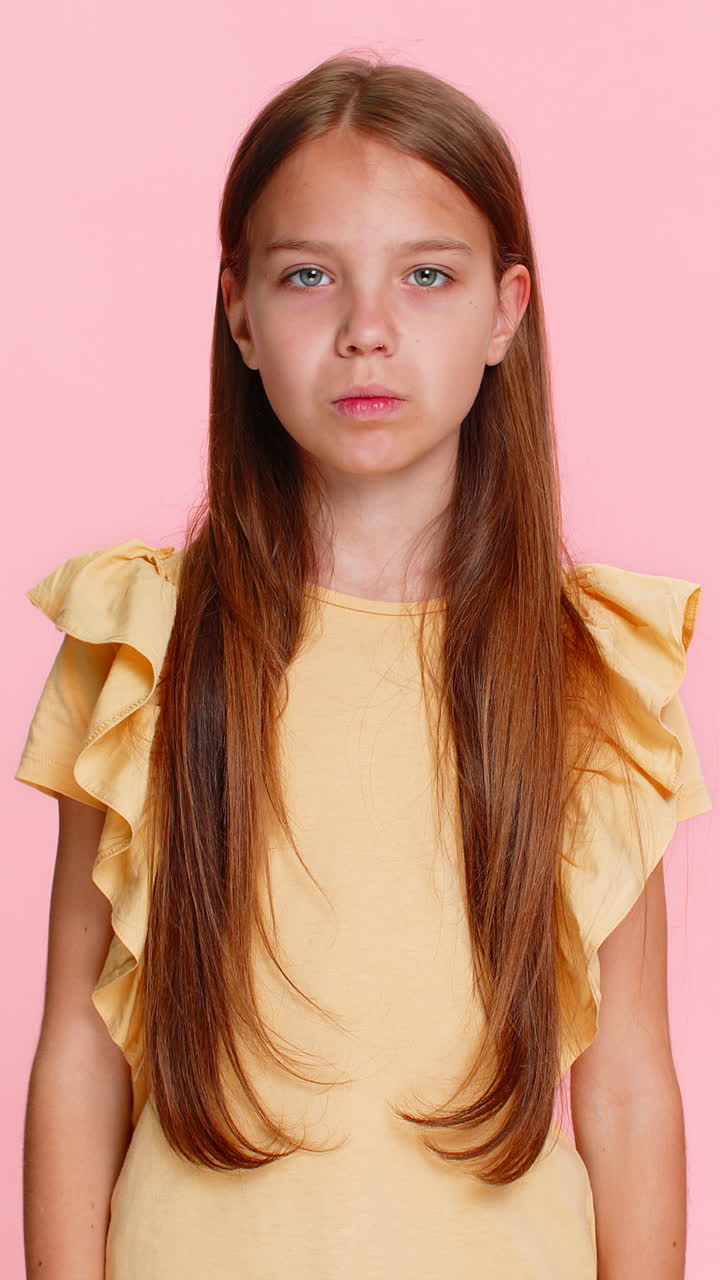 Child girl kid shaking head showing hand gesture no expressing refusal or disapproval emotionally