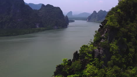 steep rock cliffs above phang nga bay and ko panyi floating village