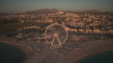 a ferris wheel in sunset in marseille during summer
aerial view of marseille in sunset