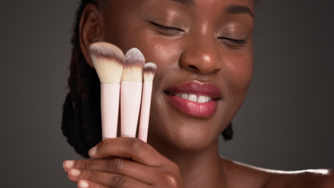 Woman with makeup brushes