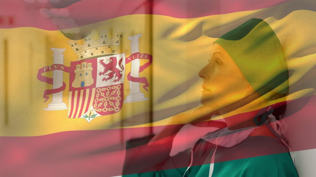 Koronavirüs pandemisi sırasında arka planda sağlık çalışanıyla İspanyol bayrağı animasyonu