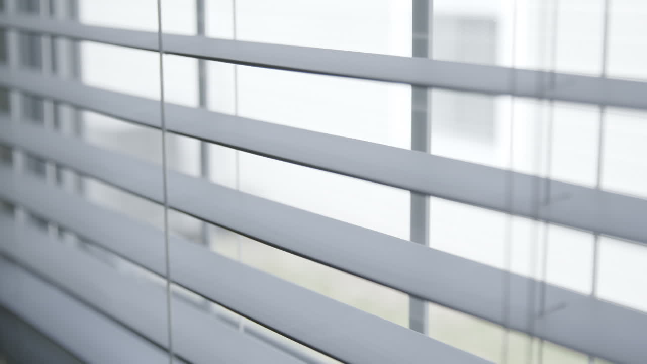 Blinds Open then Close in Slow Motion Close Up