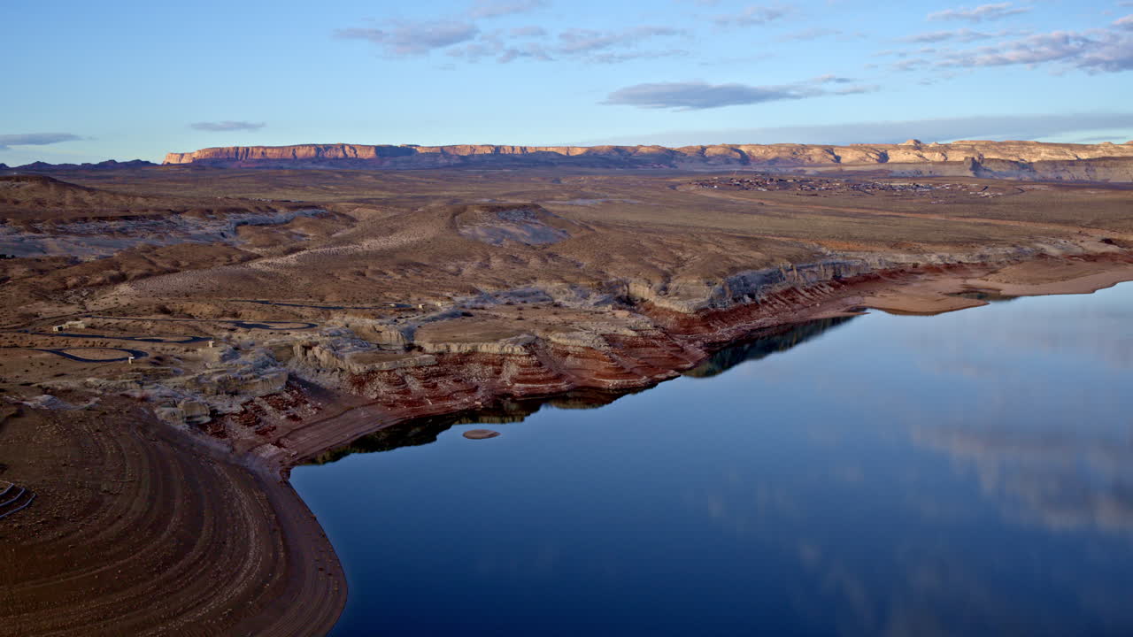 Drone footage approaching breathtaking rock formations close to Lake Powell in Page, Arizona.
