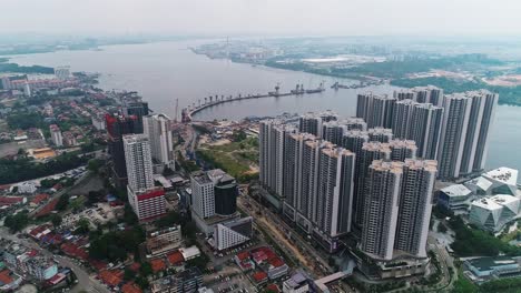 aerial birds eye view flying over mrt line rapid transit system from johor bahru