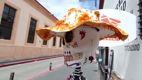 close-up shot showing a decorated skeleton for the day of the dead in mexico