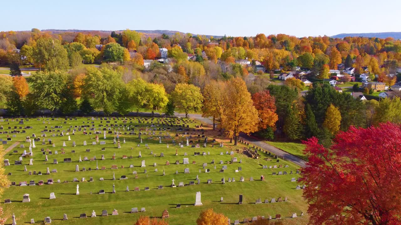 Aerial Drone over a graveyard in Estrie, Québec, Canada. Autumn.