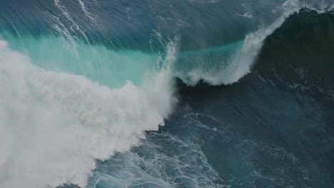 large ocean wave crashing in super slow motion