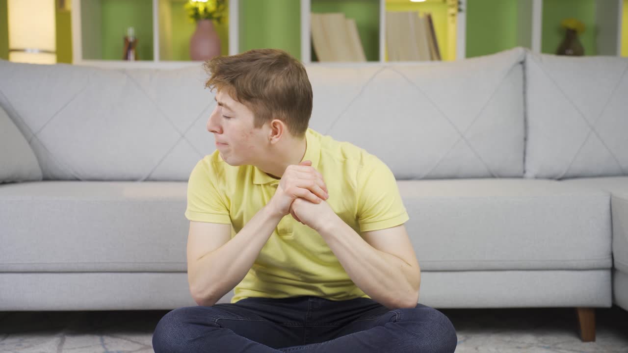Young man worried and stressed.