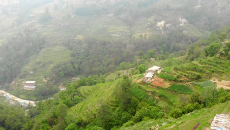 Aerial-footage-of-step-farming-or-terrace-farming-in-the-mountains