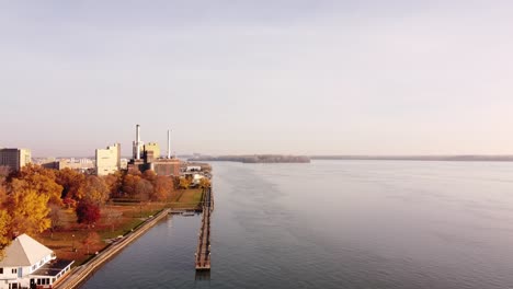 shut down power plant along detroit river during autumn at sunrise near wyandotte, michigan, usa