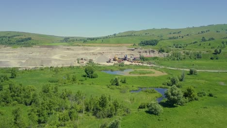 Aerial-Flying-over-the-forest-and-the-field-swamps-In-the-direction-of-the-sand-quarry