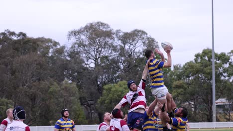 players engage in a dynamic rugby game outdoors