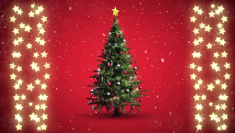 christmas tree and strings of fairy lights on red background