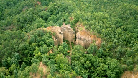 4K-Cinematic-nature-aerial-drone-footage-of-the-beautiful-mountains-at-Pha-Chor-Grand-Canyon-of-Chiang-Mai,-Thailand-on-a-sunny-day