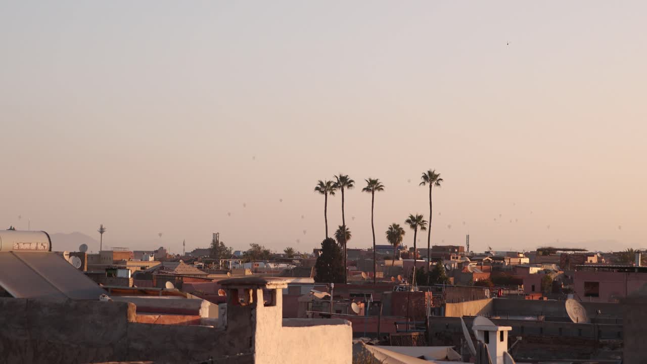 sunset view from a rooftop in the Downtown of Marrakech, Morocco