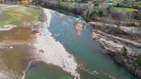4k aerial drone video of erosion and debris around hospital caused by flooded nolichucky river in erwin, tn after hurricane helene (2024)