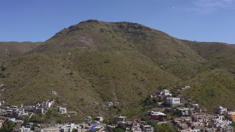 AERIAL:-Guanajuato-City-and-Mountains,-Mexico