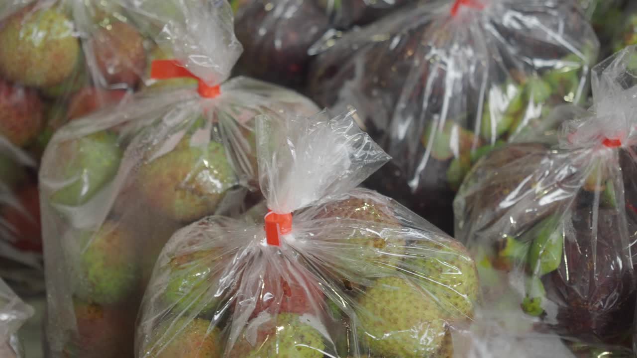Lychees in plastic bags
