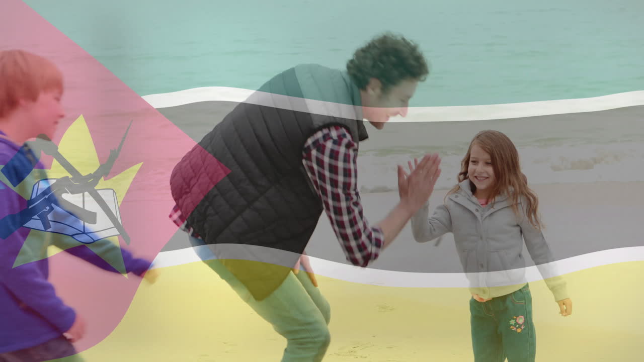 animación de la bandera de mozambique sobre padre e hija caminando por la playa