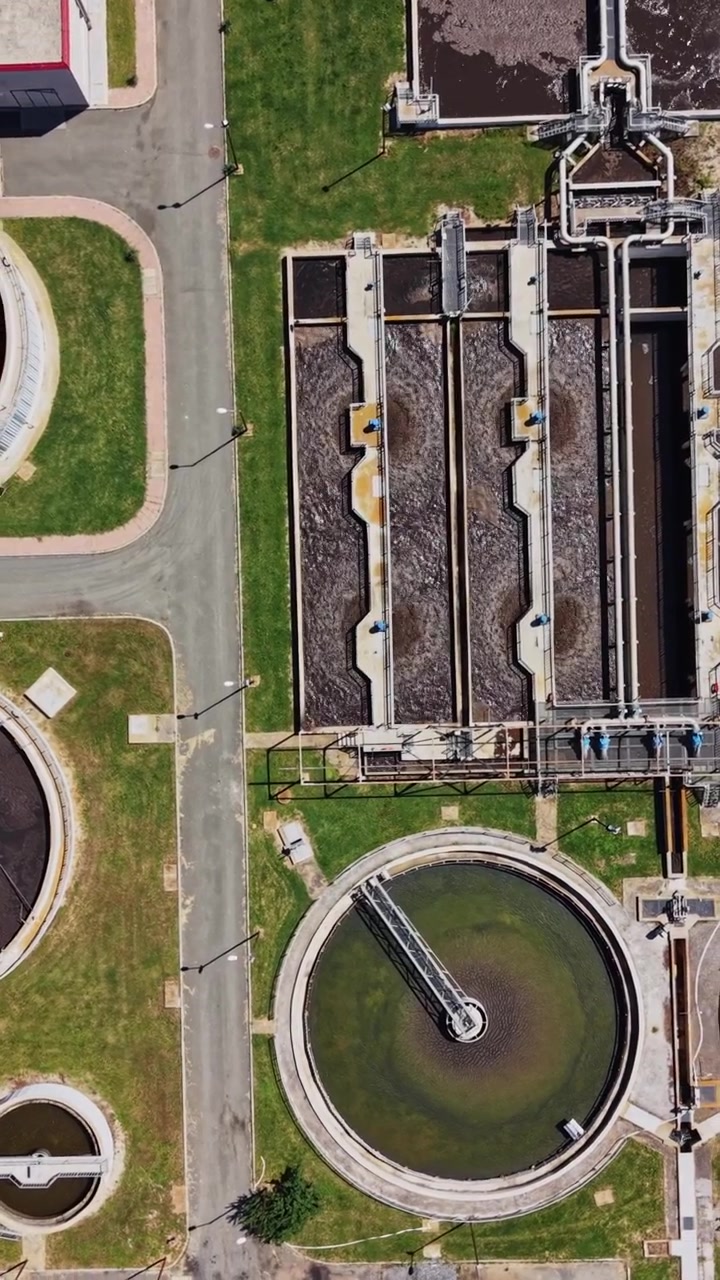 Water treatment facility in operation with various tanks and structures