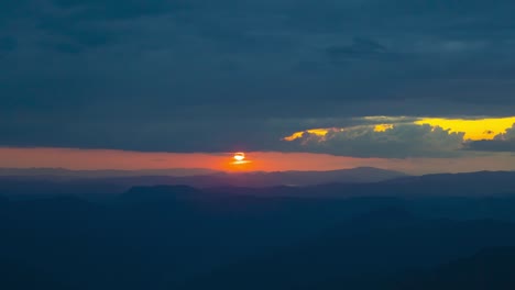 the beautiful mountain sunset on the cloud stream background. time lapse