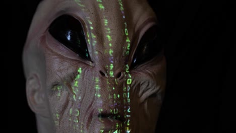alien with digital code streaming down its face