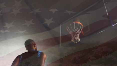 animación de la bandera de américa sobre un jugador de baloncesto afroamericano que toma un tiro