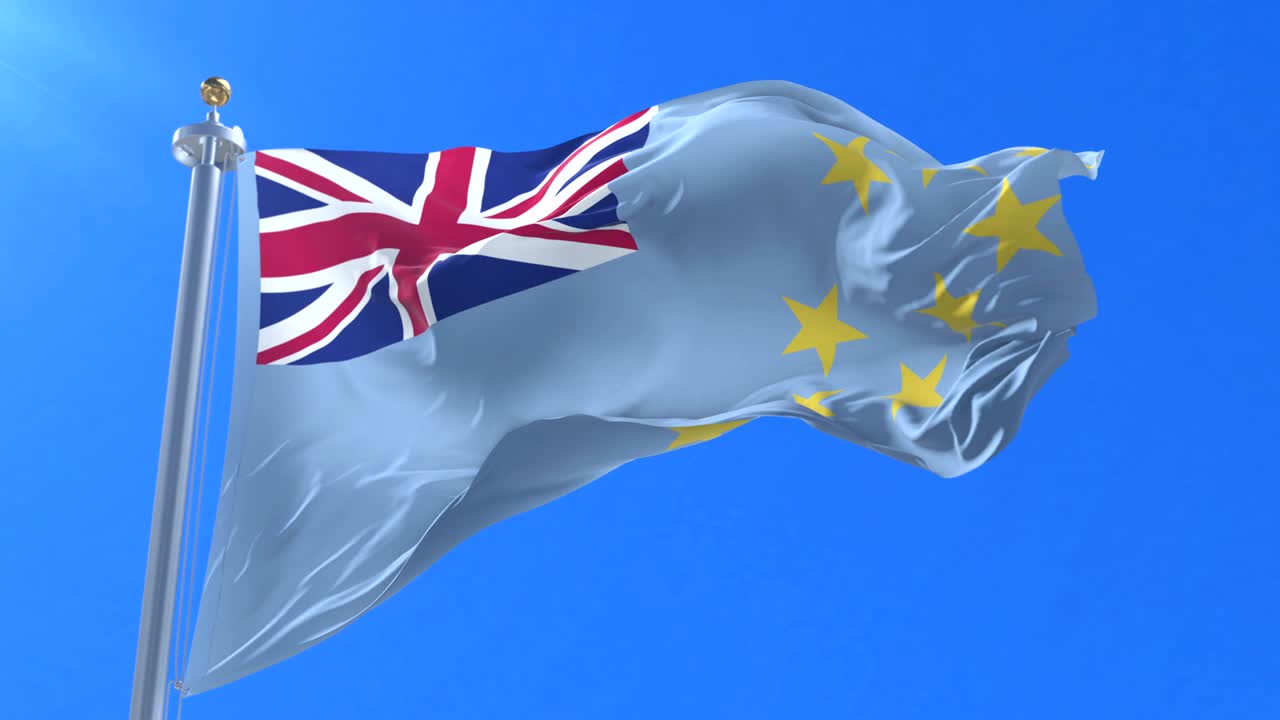 флаг тувалу, размахивающий ветром медленно с голубым небом, петля