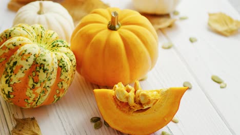 Yellow-pumpkins-and-dried-leaves