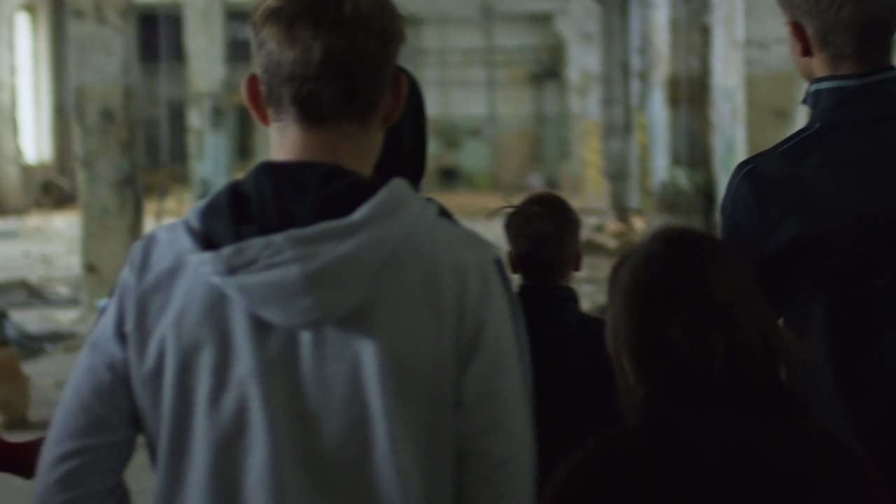 Young Friends in Abandoned Building