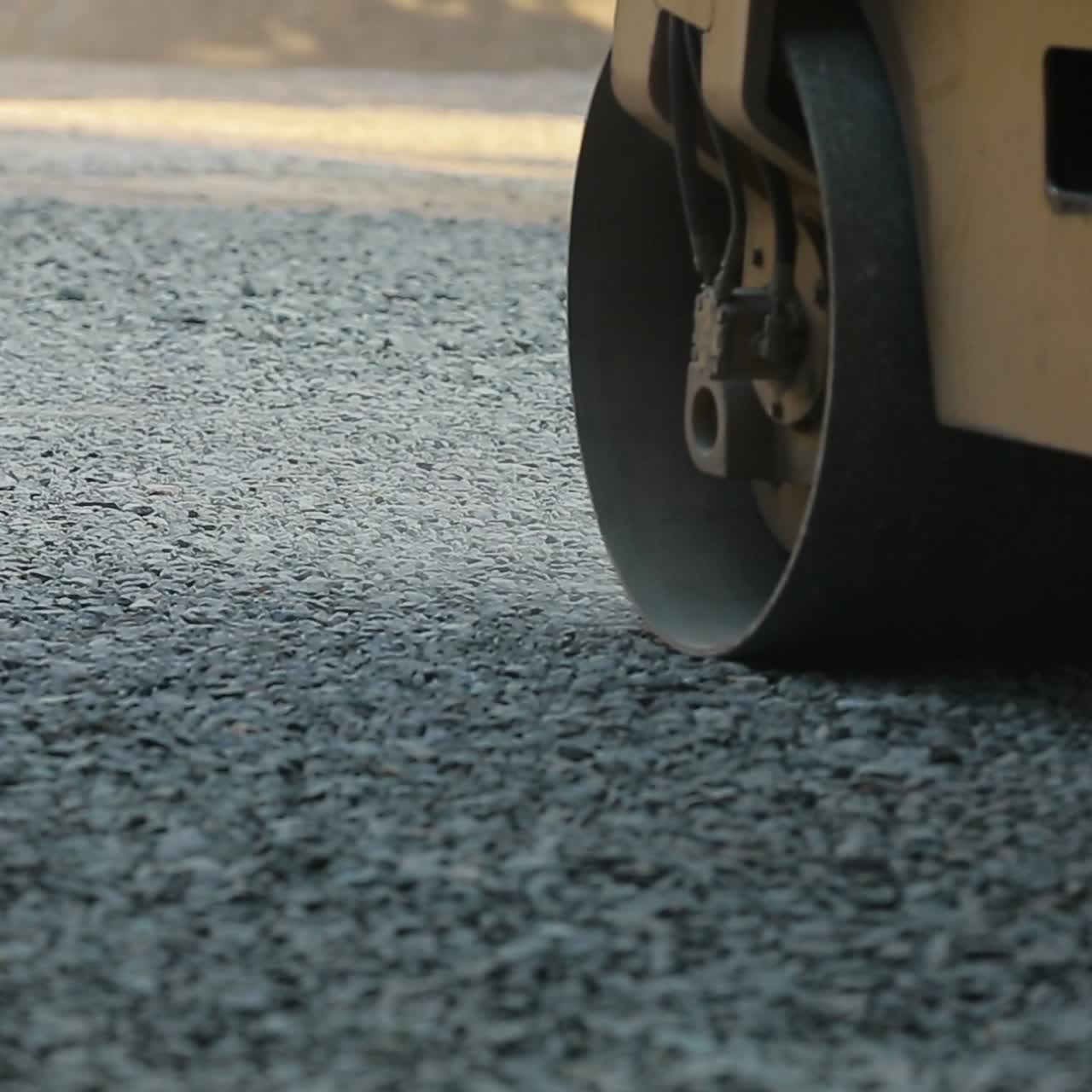 Road Roller Working On A Gravel