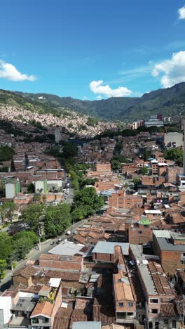 experience medellín, colombia, through an aerial view capturing its vibrant cityscape, surrounded by the majestic andes mountains and lush greenery. perfect for cultural and travel-focused projects.