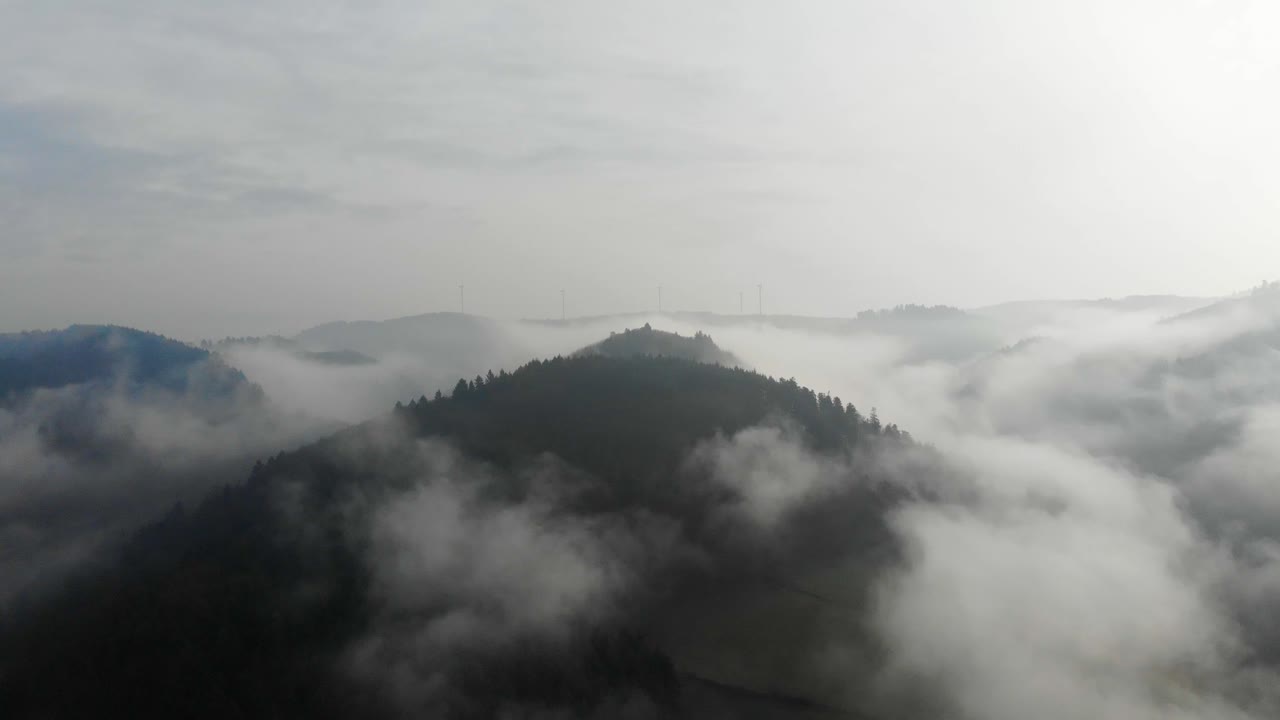 Drone view flying over the Baden-W&uuml;rttemberg Odenwald Nature park on a foggy day, Germany