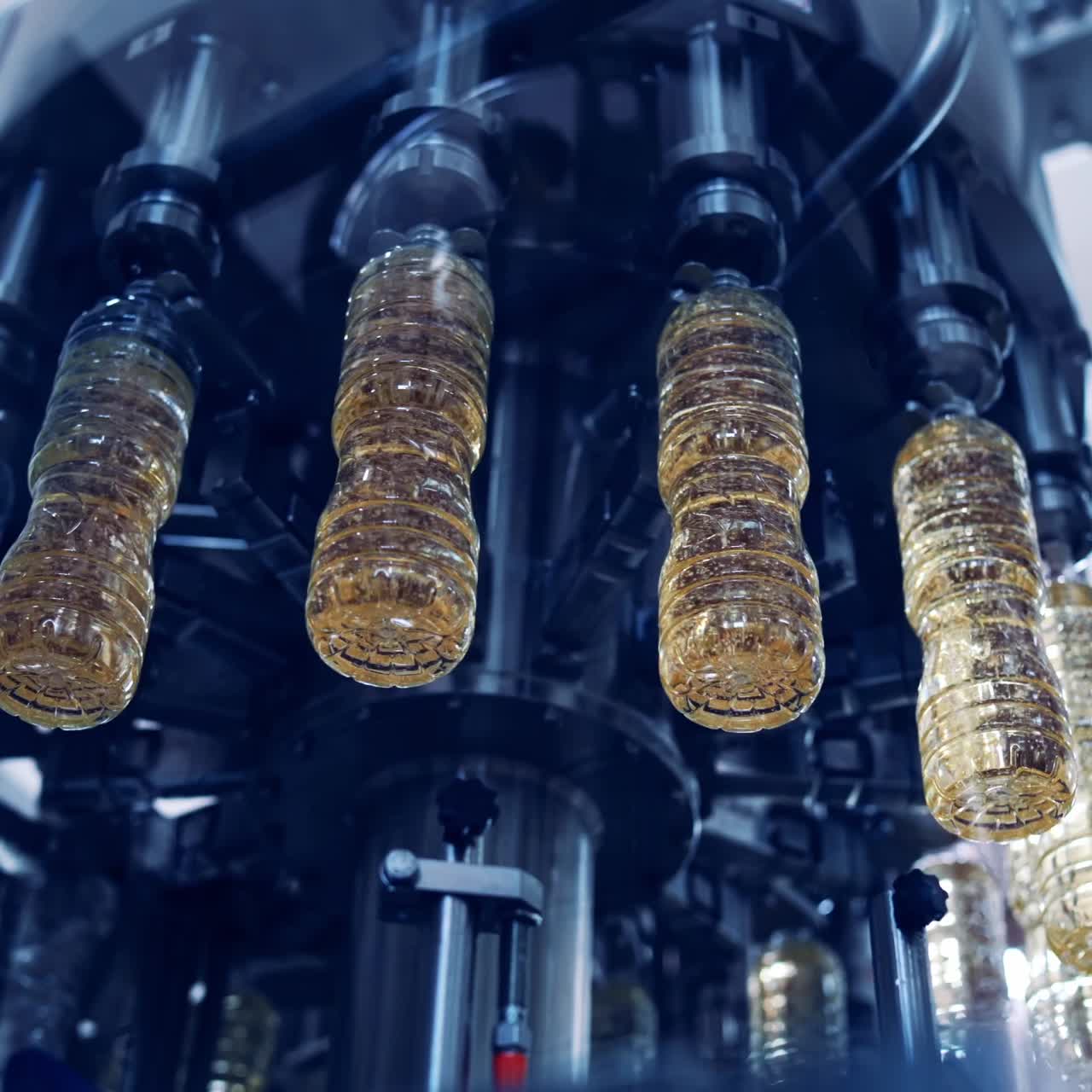 Automated Oil Bottle Filling in a Factory
