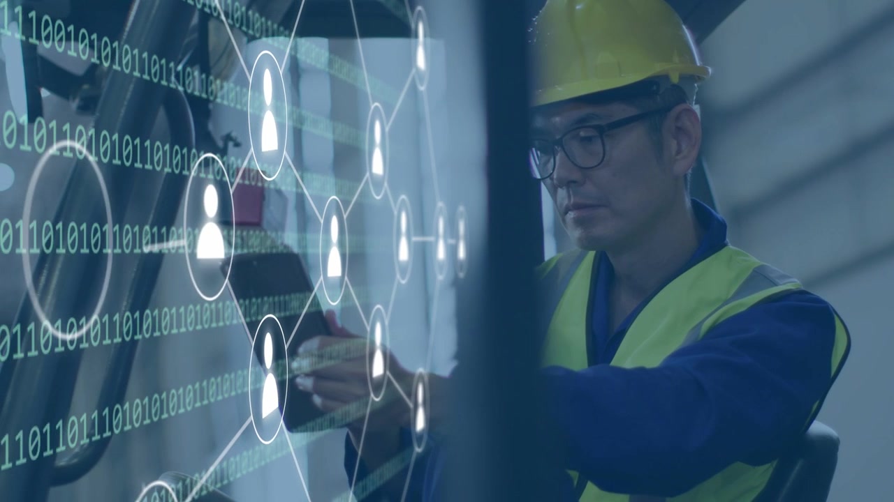 Male technician tapping tablet in factory and activating network UI over wheel, diagnosing gear