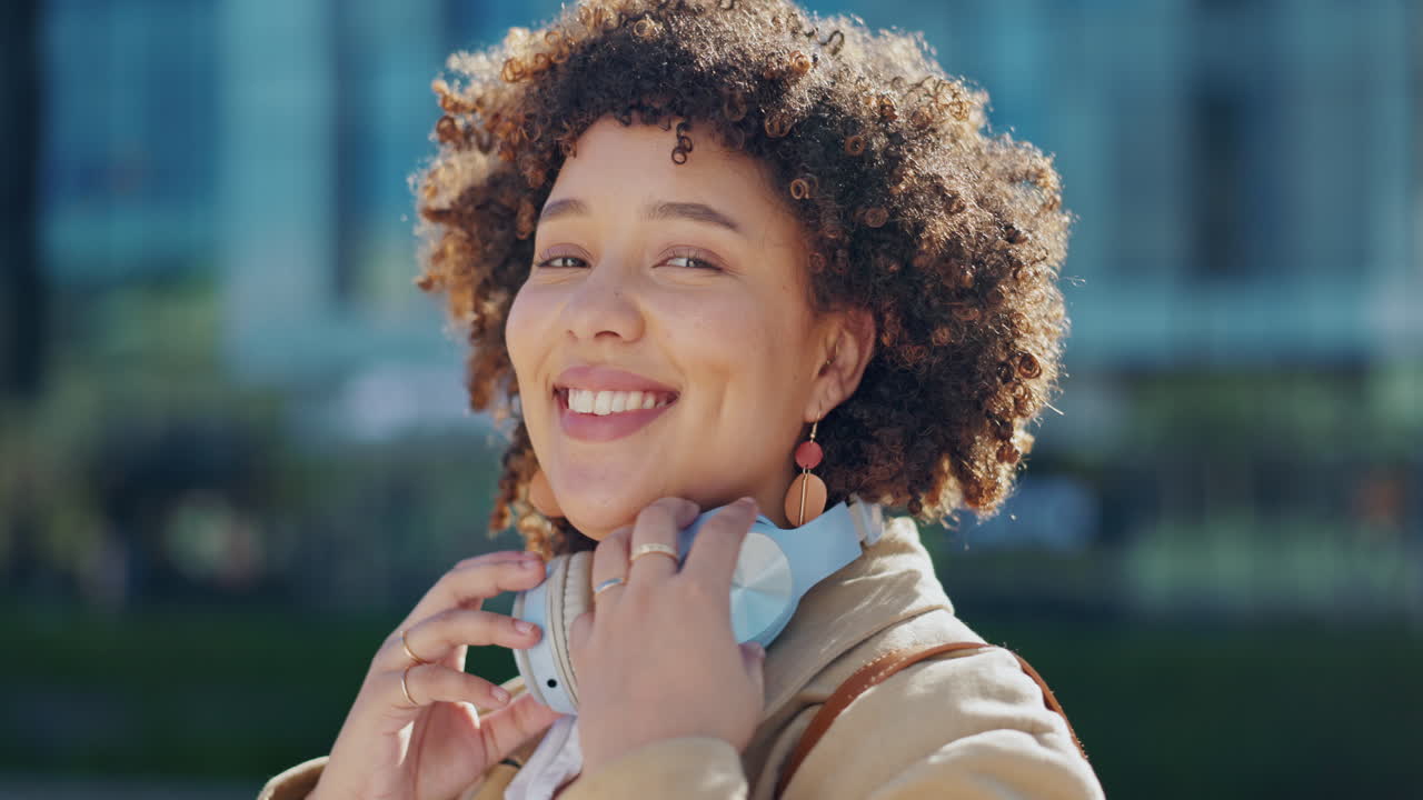 Black woman in city, face and headphones
