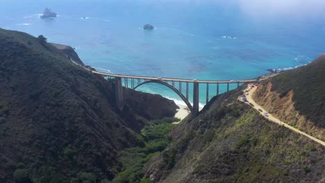 Open-Spandrel-Deck-Arch-Bridge-Architecture-of-Bixby-Bridge,-California---Aerial-Drone